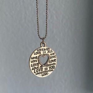 Silver love necklace with heart cutout
